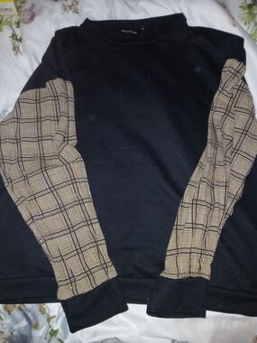 PrettyLittleThing Black Crewneck Sweater with Tan Plaid Sleeves